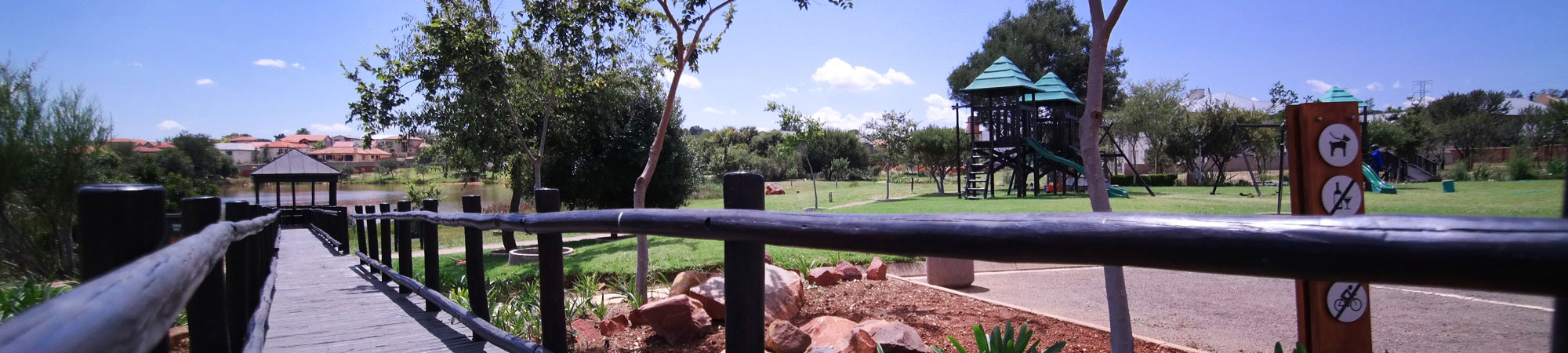 The estate was proclaimed in January 2002 as a full title and sectional title development comprising 494 landowners made up of 247 full title stands and 8 sectional title developments which comprise 247 upmarket sectional title units. The property was originally portion 95 of the Farm Tweefontein 372-JR. and is situated on the eastern most border of Pretoria. The original farm house, which forms part of the many photographs included in this web site, has been converted to the Gallery clubhouse.