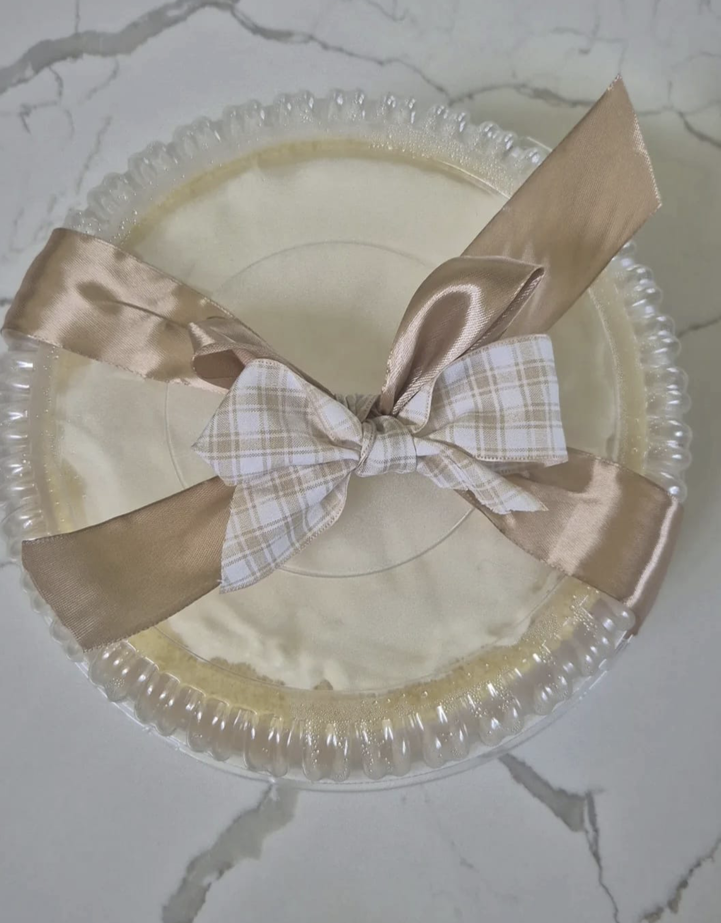 Ginger flan: the baked crust is fi lled with sweet ginger (or pineapple), then topped with whipped cream before being packaged and tied with a festive bow. Ginger flan: the baked crust is fi lled with sweet ginger (or pineapple), then topped with whipped cream before being packaged and tied with a festive bow.